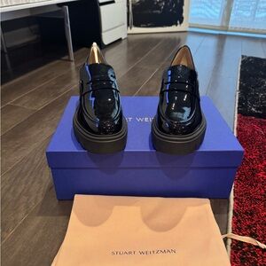 Stuart Weitzman Glossy Black Loafers